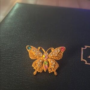 Elegant Gold Butterfly Brooch with Multicolor Accents